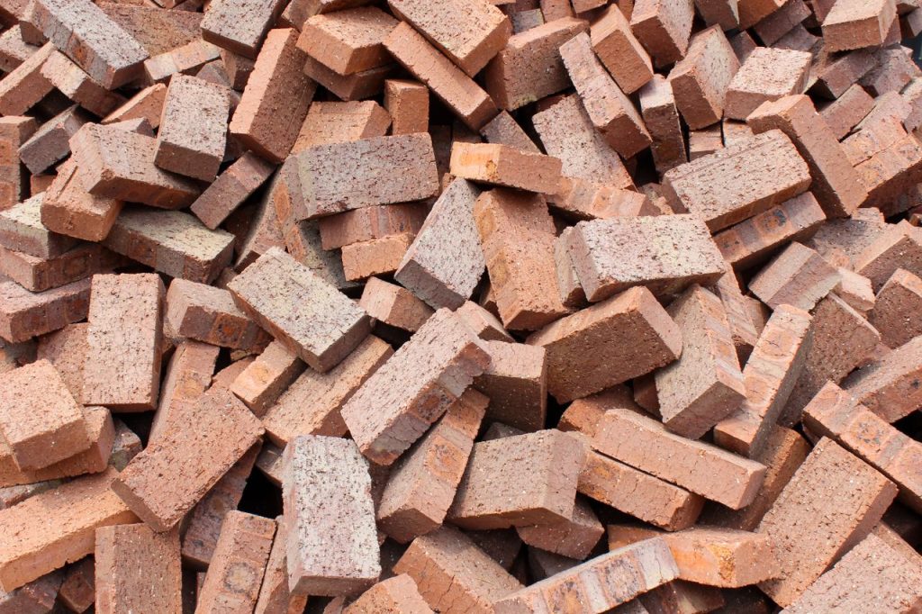 The Art of Drawing Readers In: Your attractive post title goes here A large pile of red bricks suitable for construction and building projects in Indonesia.